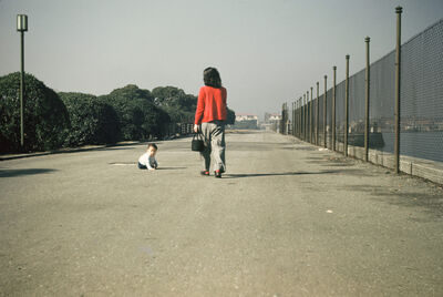 Yokohama, Japan - a woman with a baby on the road